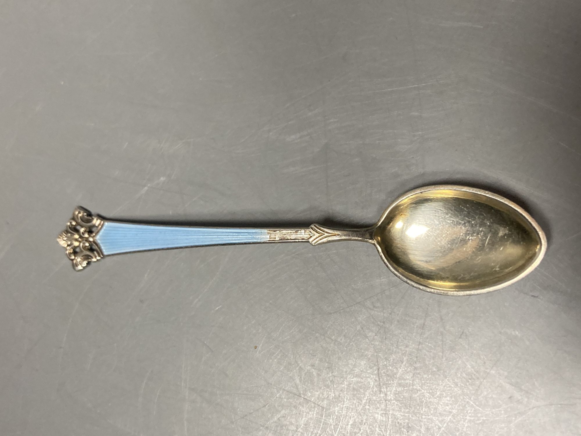 A modern silver hexagonal pill box, a continental 925 and enamel coffee spoon, pencil, lid and 925 key ring.